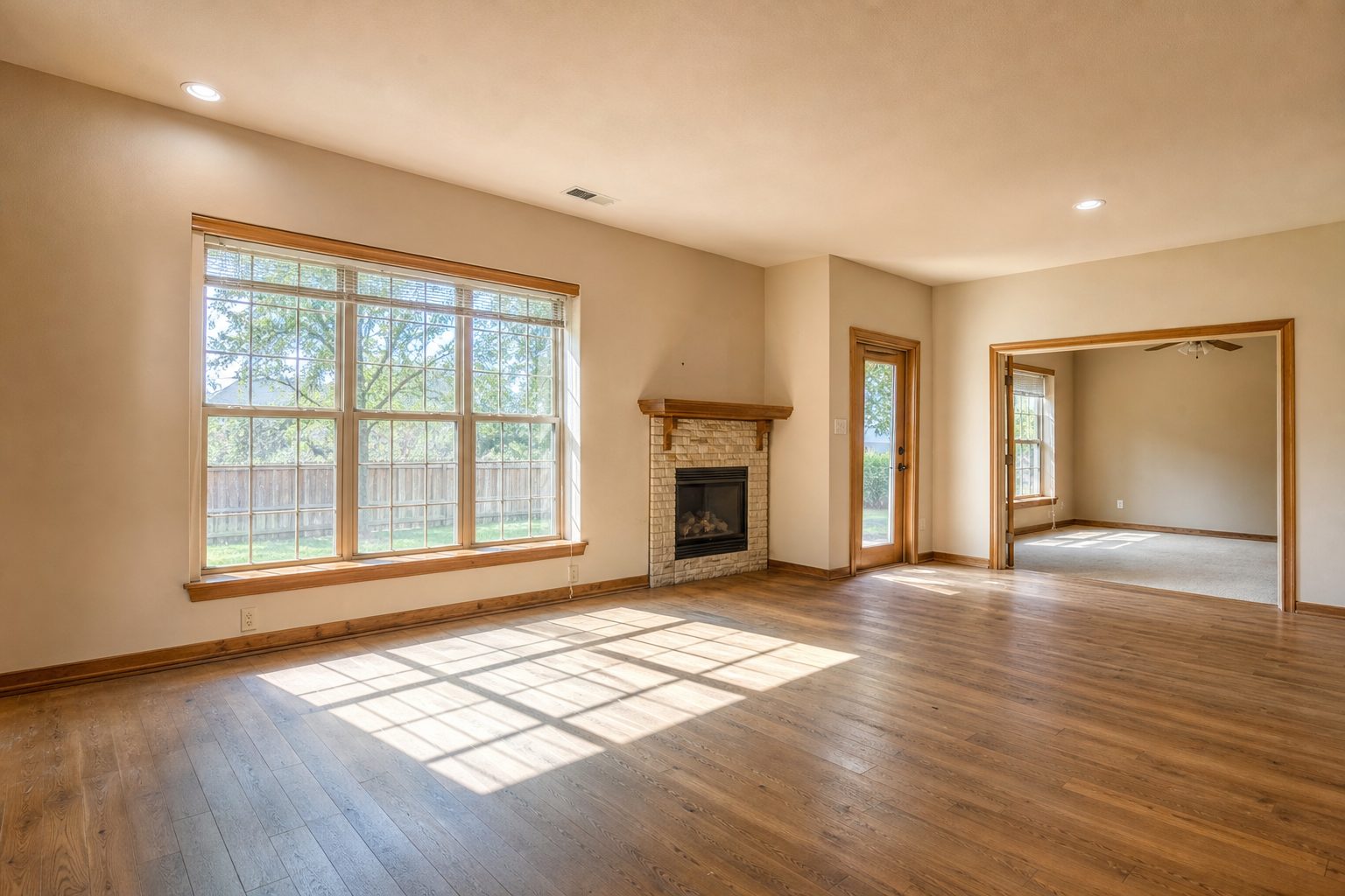 Bright interior living space with natural window light in mid-priced Weatherford rental home.