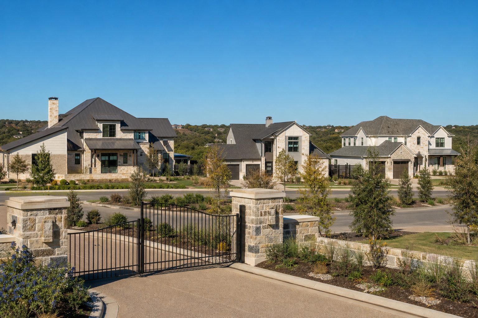 Luxury gated neighborhood street with contemporary two-story homes and stone facades in Rio Vista, Kelly Ranch Aledo.