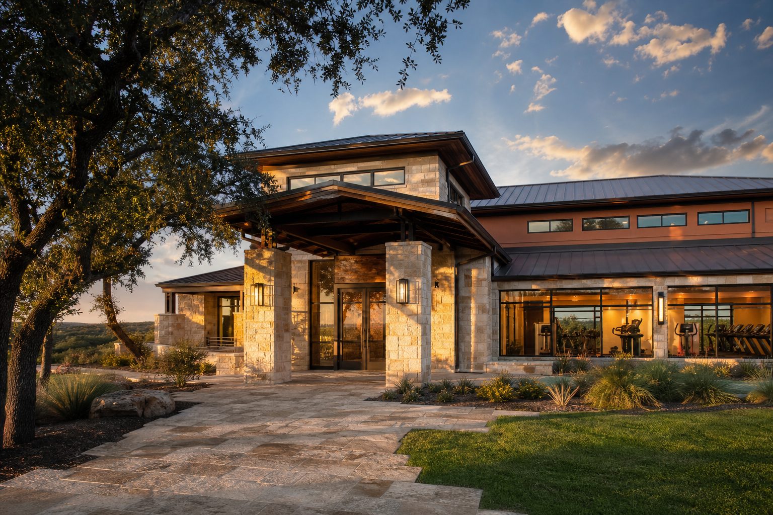 Modern resort-style amenity center with stone facade and manicured entry in Kelly Ranch, Aledo, Parker County Texas.